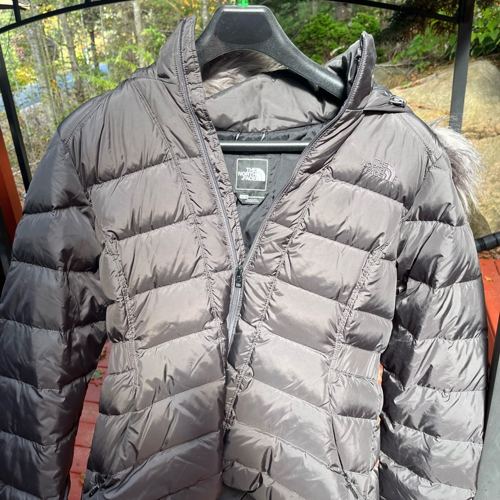 Womens XL North Face jacket with hood.